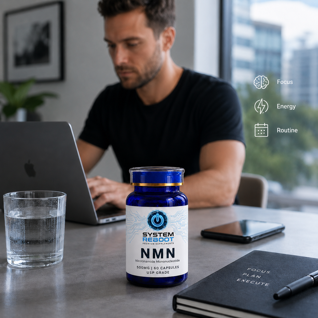 System Reboot NMN bottle on desk beside man working at laptop